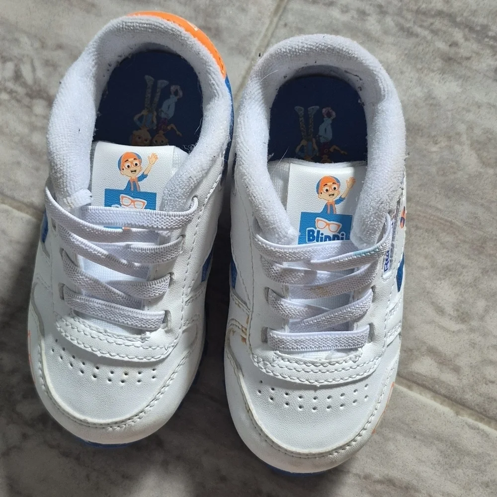 Reebok Kids Sneakers in White and Blue with Orange Accents